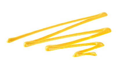 Spilled spicy mustard sauce. Yellow mustard sauce isolated on a white background.