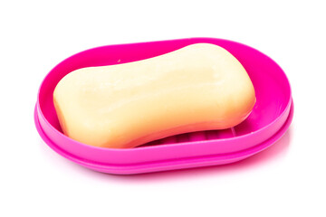 Travel soap in plastic soap dish isolated on white background