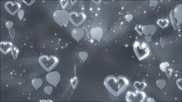 Abstract 3D animation, celebration festive background. 4K silver hearts moving rotating falling.