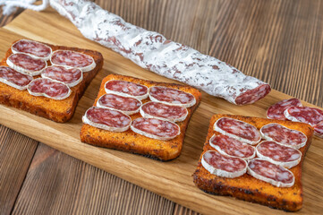 Toasts with fuet