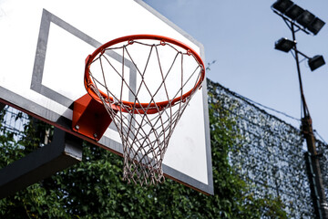 Naklejka premium basketball hoop at the school stadium. college basketball sports