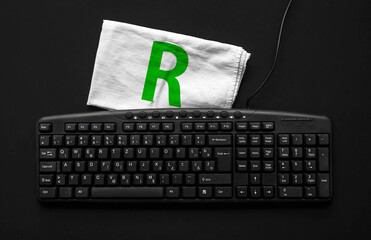 R programming language. Rag width word R and pc keyboard.
