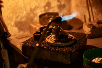 Silver making, handicraft, chasing and nielloing. Traditional work in the mountain village of Kubachi, Dagestan.
