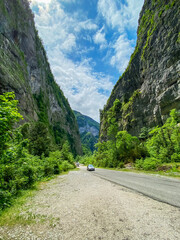 The road in the Karmadon gorge in the summer. Republic Of North Ossetia - Alania. Russia