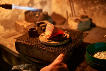 Silver making, handicraft, chasing and nielloing. Traditional work in the mountain village of Kubachi, Dagestan.