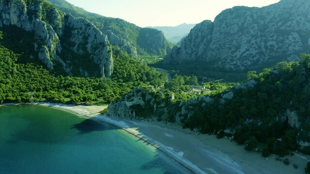 Aerial view of ancient Olympos ruins with valley between mountains, Antalya Turkey