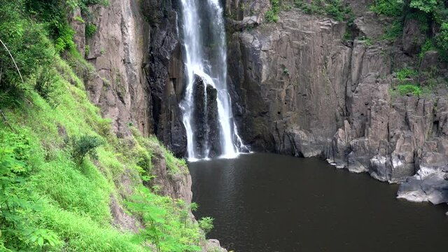 Haew Narok Waterfall is beautiful in the forest area of Khao Yai. Above the waterfall is a path through the forest elephants. So those animals die every year. Khao Yai National Park, Thailand 2021