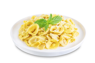 Fresh prepared Tortellini pasta with basil on a white isolated background