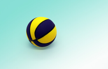 Obraz premium bright ball-expander for the hand on a gradient green background.
