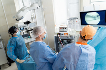 Modern equipment in operating room. Team surgeon at work in operating room.