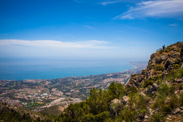 Benalm&aacute;dena teleferico shot from the top of Calamorro with city and coastline in the background. Andalusia, Spain.