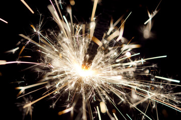 Obraz premium Night dark background with a sparkler