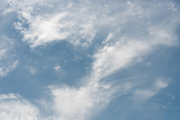 blue sky with high diaphanous cloud formations