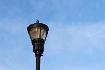 Fototapeta na wymiar Lamp Light Against Blue Sky