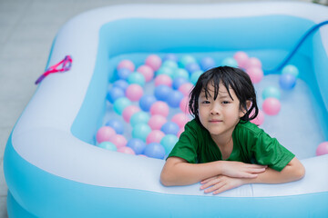 kid swimming at the pool, happy time