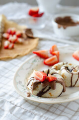 pancakes with chocolate and strawberry