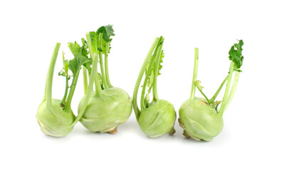 Fresh kohlrabi with green leaves on isolated white background