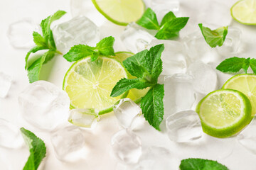 Alcohol cocktail mojito with lime and mint in copper glasses with ice. Summer refreshing drink