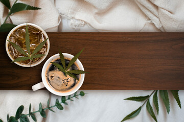 cannabis coffee with coffee beans on table on the table