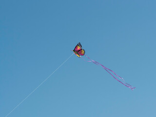 Butterfly Kite Against a Blue Sky
