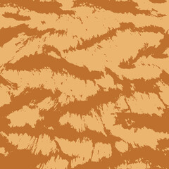 Seamless natural wild cat skin pattern with stripes in warm beige and ochre brown colors