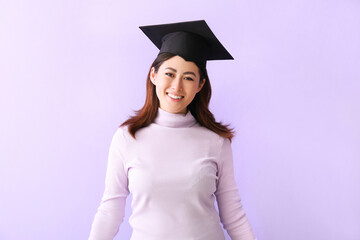 Female graduating student on color background
