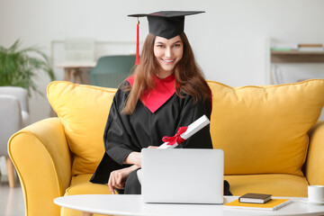 Happy female student on her graduation day at home. Concept of studying online