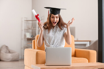 Happy female student on her graduation day at home. Concept of studying online