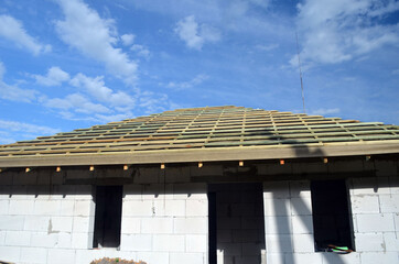 Wood roof trusses. House construction. 