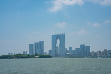 The skyline in Suzhou, China, along the Jinji lake, on a sunny day.