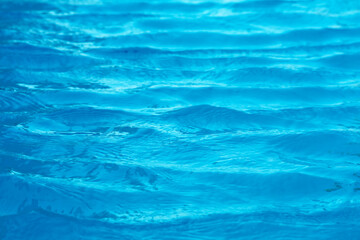 water of ocean is so clear that you can see sand and shells in water
