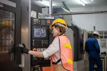 Portrait of female factory worker.  Engineer women are working with machines cnc