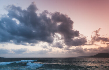 Fototapeta na wymiar Stormy Sea is under dramatic cloudy sky