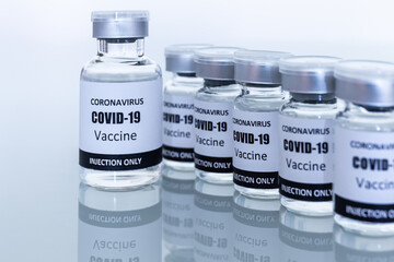 Many Vaccine bottle for vaccination against coronavirus or covid-19. Select focus