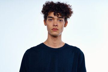 cute guy with curly hair cropped view isolated background studio