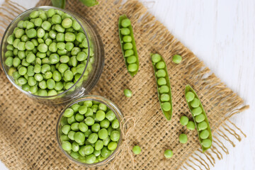 Fresh green peas. Flat lay. Home-grown young peas. Farm