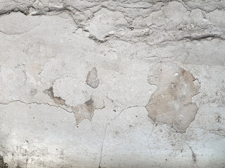 Gray cement stucco with grunge dirty cracked pattern, old wall background