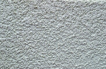 Decorative plaster fur coat. Gray shades