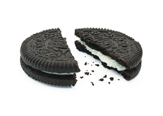 Stuffed cookies and cream flavor, Broken piece with crumbs, Tasty sweet snack, Isolated on white...