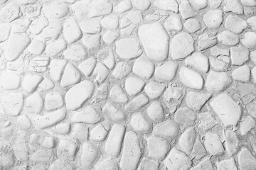 old stone pavement background / abstract pavement, large cobblestones, old road texture