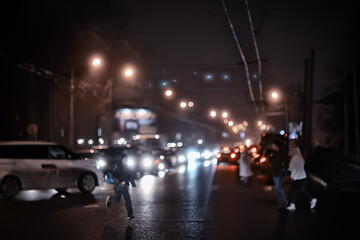 traffic of cars in the night city, view from the car, lights abstract auto background