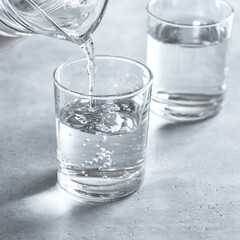Water pouring into glass
