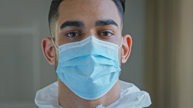 Portrait Sad Male Face Tired Ethnic Arabic Hispanic Doctor Man Medical Worker Surgeon Specialist Wear Protective Mask During Pandemic Corona In Hospital Looking At Camera After Complicated Operation