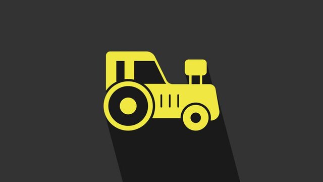Yellow Tractor icon isolated on grey background. 4K Video motion graphic animation