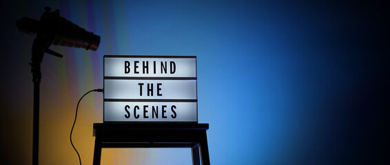 Behind the scenes letterboard text on Lightbox or Cinema Light box. Movie clapperboard megaphone...