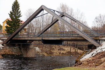 Umea, Norrland Sweden - May 12, 2021: modern bridge over the Savar river