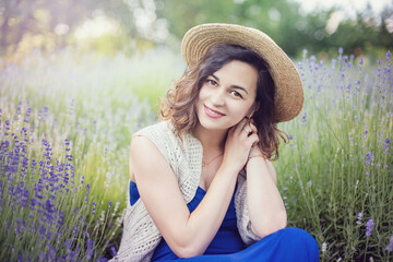 Outdoor Lifestyle portrait of pregnant woman expecting baby at sunset in nature. Expecting belly. Concept of pregnancy, maternity. Freedom concept. Enjoyment. Young woman relaxing enjoying fresh air