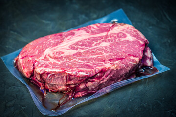 The marbled beef steak in a vacuum pack.