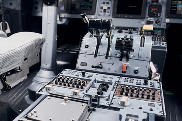 Knobs and buttons. Close up focused view of airplane cockpit