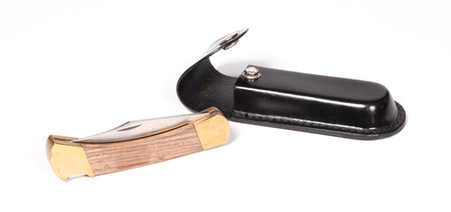 Vintage pocketknife with leather case, isolated - obrazy, fototapety, plakaty